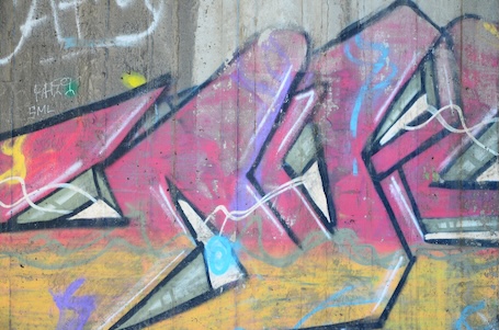 Graffiti removal for brick concrete metal and painted surfaces